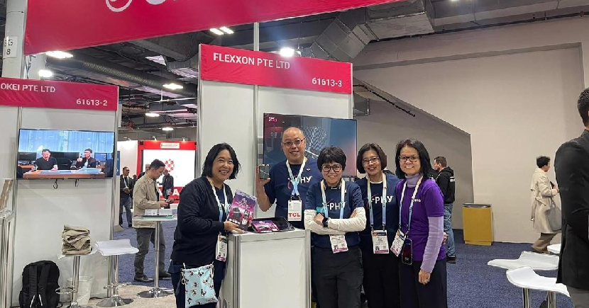 Ms Chan (centre) and Ms Chng (second from right) with the Flexxon team at the Consumer Electronics Show in Las Vegas in 2023