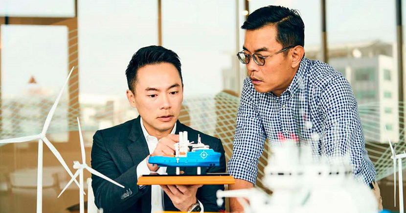 Marco Polo Marine CEO Sean Lee (left, pictured with subsidiary MP Offshore’s director Roy Yap) examines a model of the company’s US$60 million commissioning service operation vessel.