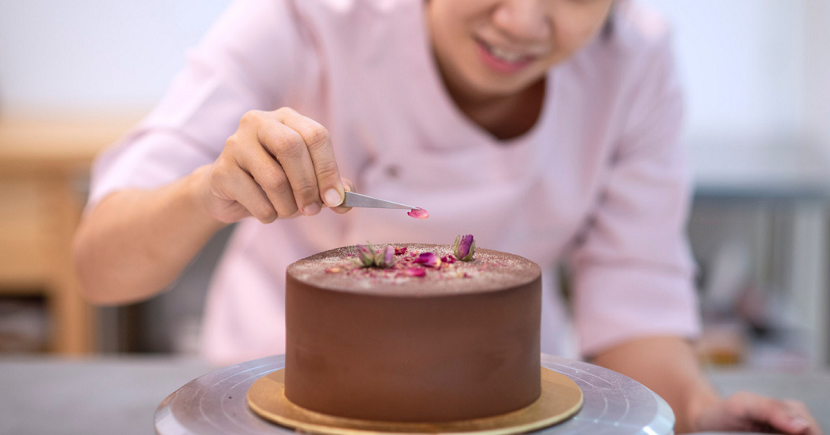 Finishing touches being added to RÒA’s popular vegan chocolate cakes